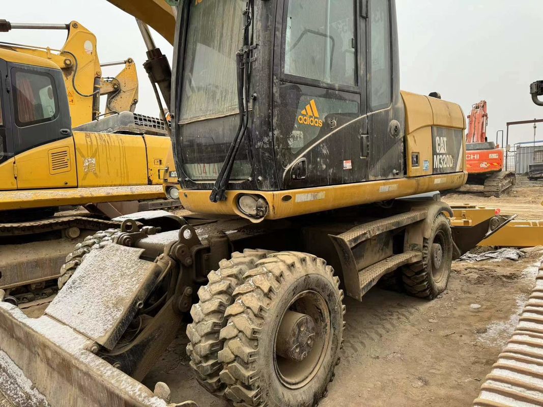 90% Caterpillar M317D2 高品質で最高性能の車輪用掘削機を販売する