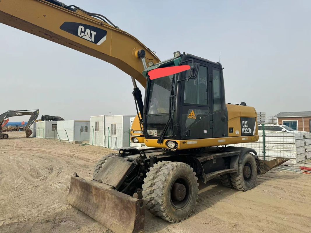 90% Caterpillar M317D2 高品質で最高性能の車輪用掘削機を販売する