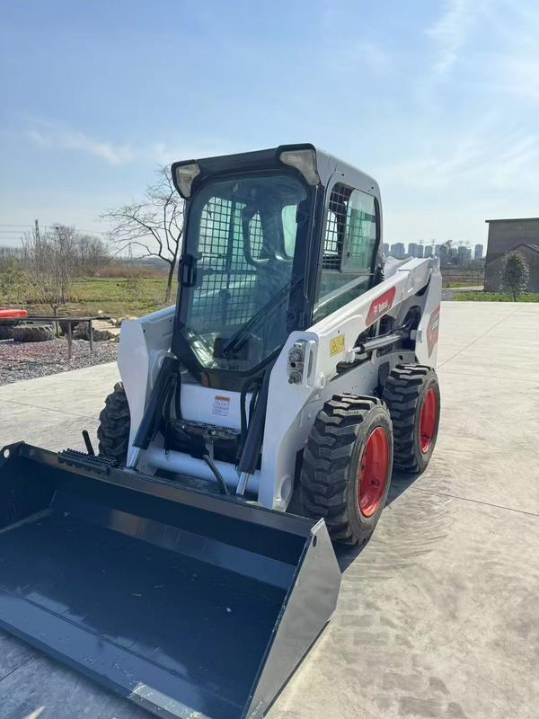 中古のBobcat S550スキッドステアローダー 中国 信頼できる輸出業者 輸送幅1.727m